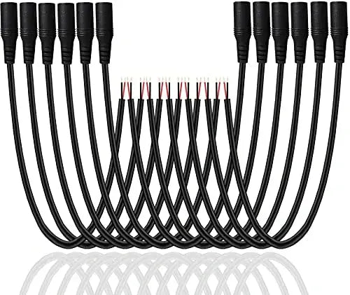 Set of black cables with connectors on a white background