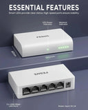 Two white network switches with labeled features on a dark background