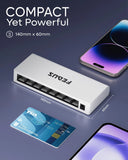 White USB hub with multiple ports on a dark background, showing dimensions and a smartphone for scale.