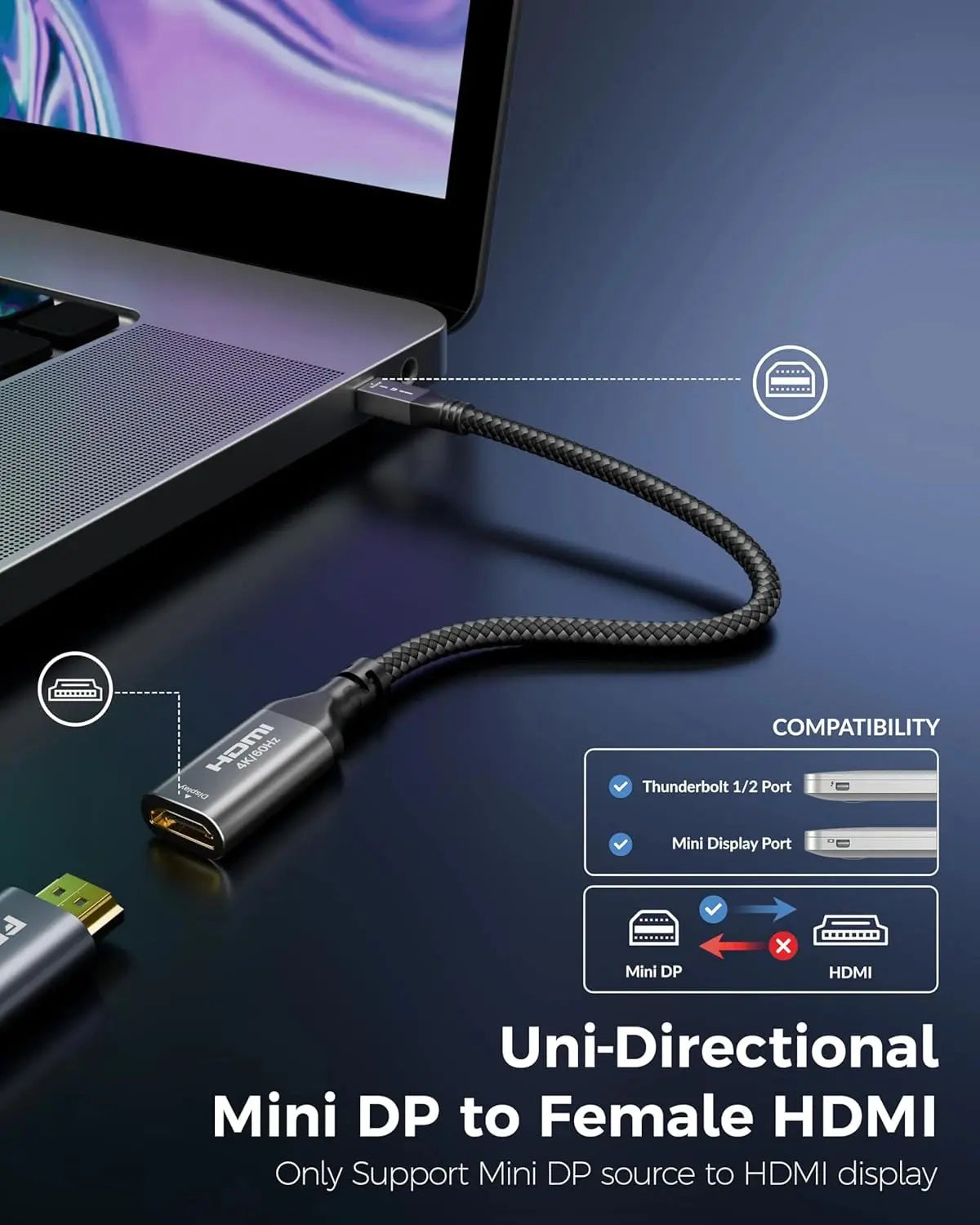 Uni-Directional Mini DP to Female HDMI cable with laptop connection on a dark surface