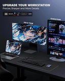 Computer setup with multiple monitors displaying anime-themed wallpaper on a dark desk.