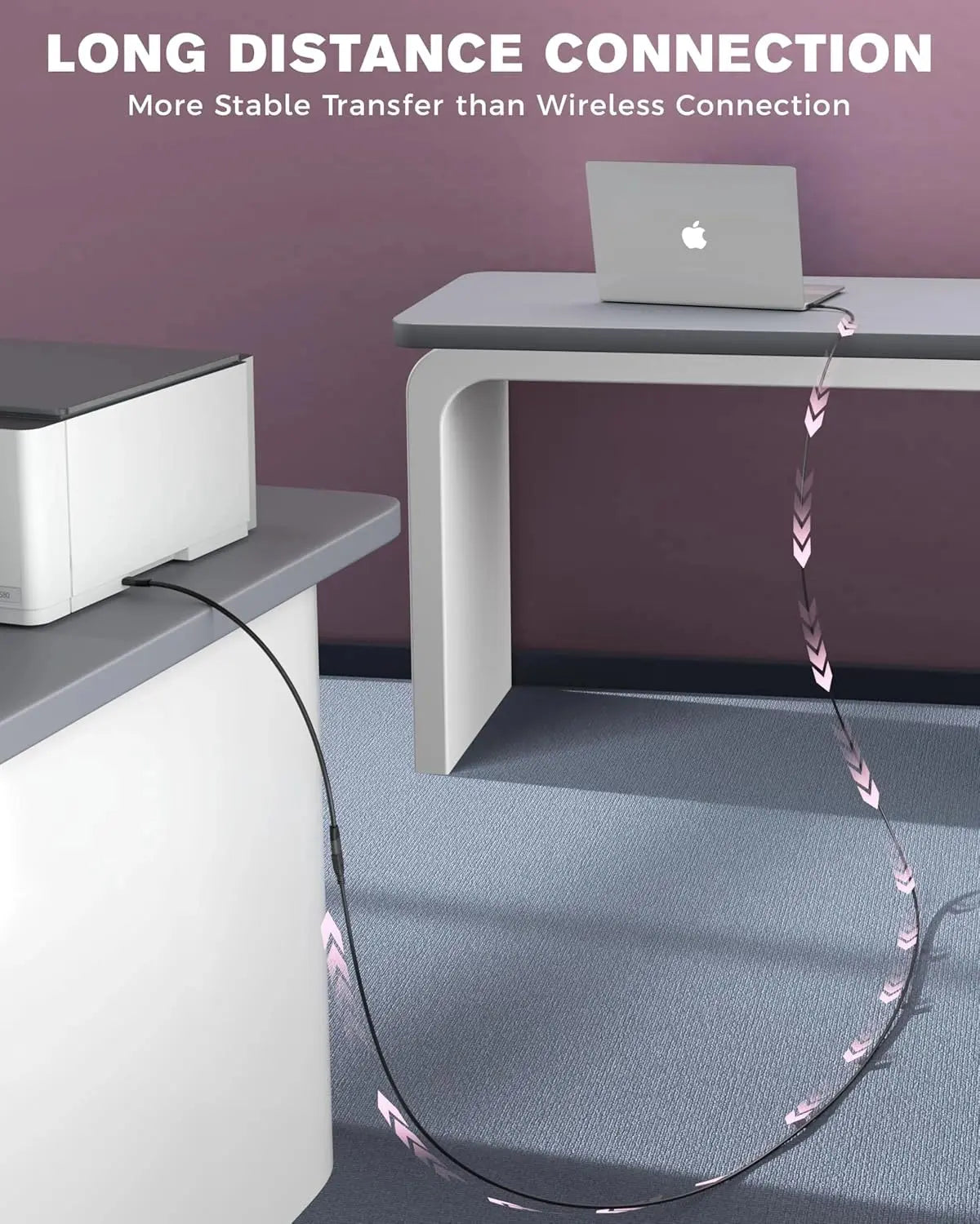 Laptop connected to a device with a cable on a desk, emphasizing long-distance connection stability.