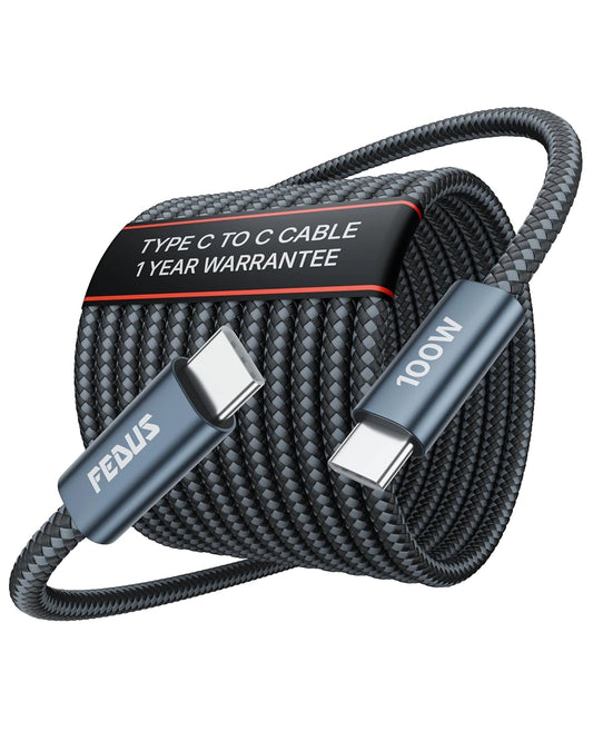 A coiled black braided Type C to Type C cable with metallic blue connector housings, shown on a plain white background. A black label wrapped around the cable reads 'TYPE C TO C CABLE 1 YEAR WARRANTY' and the connector ends are marked 'FEDUS' and '100W'.
