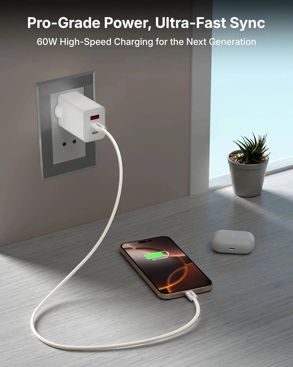 White power adapter charging a smartphone on a wooden floor with a plant in the background.